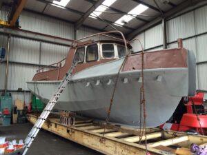 Exterior of the MV Ross Point sand blasted and primed by Hickman Engineering