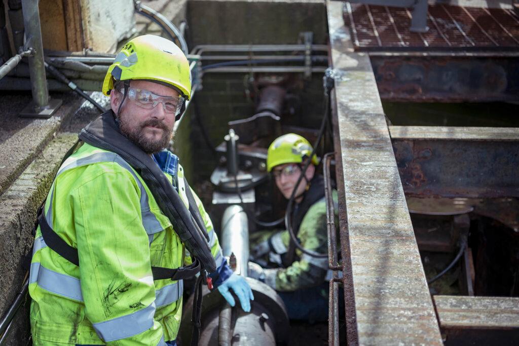 Adam Osborne and Ryan Hickman from Hickman Engineering investigating the dock gate at Grimsby Docks