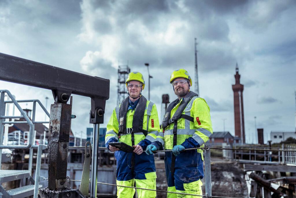 Adam Osborne and Ryan Hickman from Hickman Engineering investigating the dock gate at Grimsby Docks