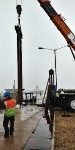 Grimsby Fish Docks - Sluice being lifted by a crane