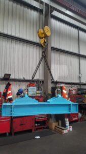 Large steel girder in light blue fabricated by Hickman Engineering