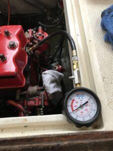 Compression tester running on a Beta Marine diesel engine