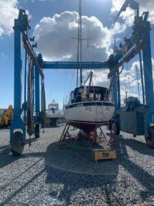 Swan Song Boat Repairs showing boat on a rig ready to be moved