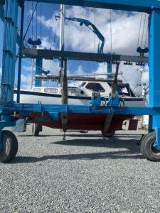 Swan Song Boat Repairs showing boat on a rig ready to be moved - side view