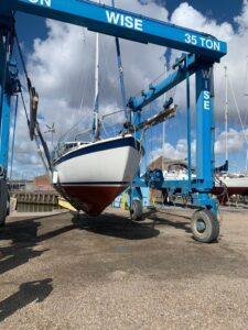 Swan Song Boat Repairs showing boat on a rig ready to be moved