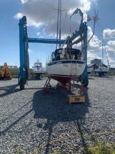 Swan Song Boat Repairs showing boat on a rig ready to be moved