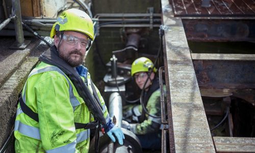 Adam Osborne and Ryan Hickman from Hickman Engineering investigating the dock gate at Grimsby Docks