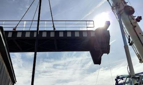 A crane used to lift a road access bridge away to be repaired - Hickman Engineering